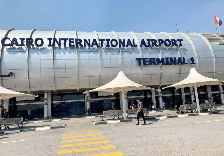 Cairo International Airport Terminal 1 exterior, critical infrastructure requiring cybersecurity and data protection measures for airline operations