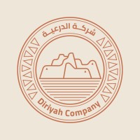 Diriyah Company official circular logo with stylized mountain landscape and Arabic and English brand name in terracotta